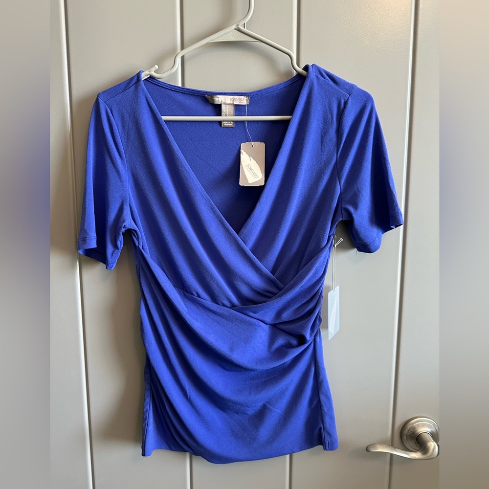 Women’s business casual top. Soft material